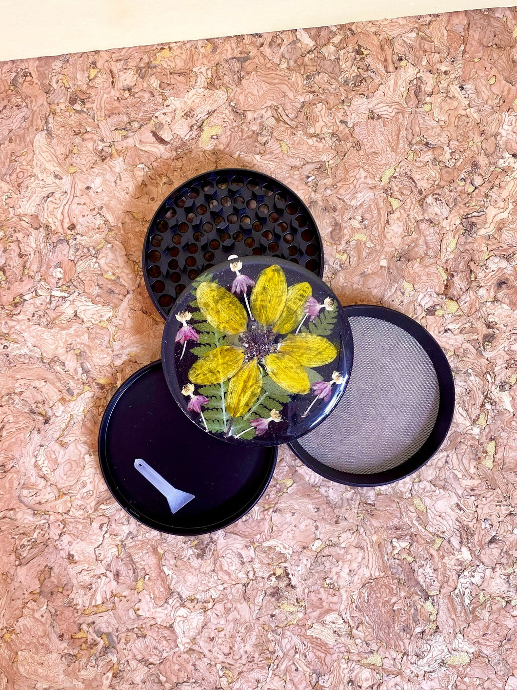 flower grinder covered in real flowers 