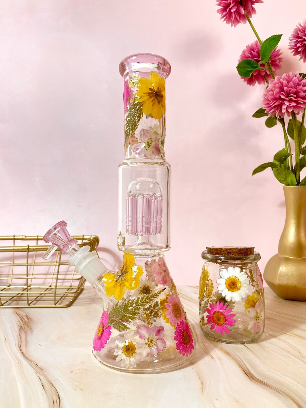 Bong with pink flowers and translucent pink percolator