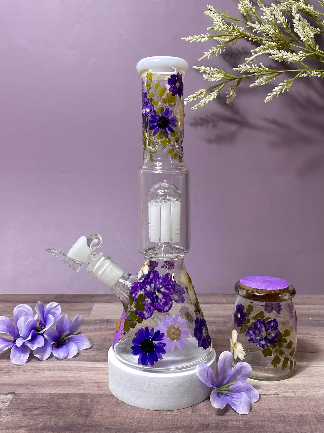 bong with purple flowers and white percolator