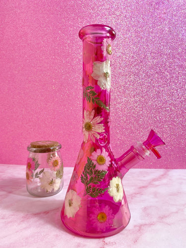 pink iridescent bong with real flowers