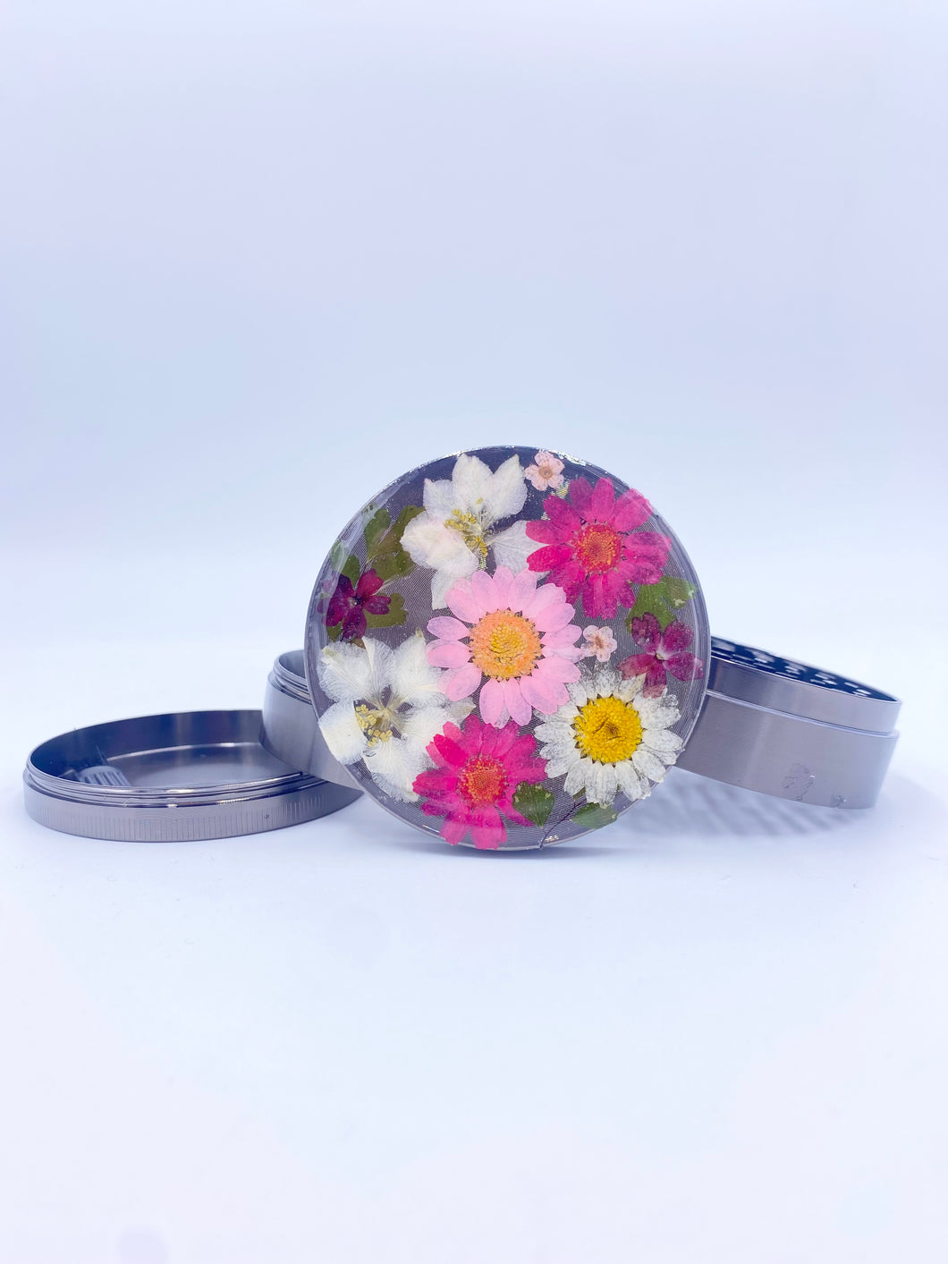 grinder covered with real flowers