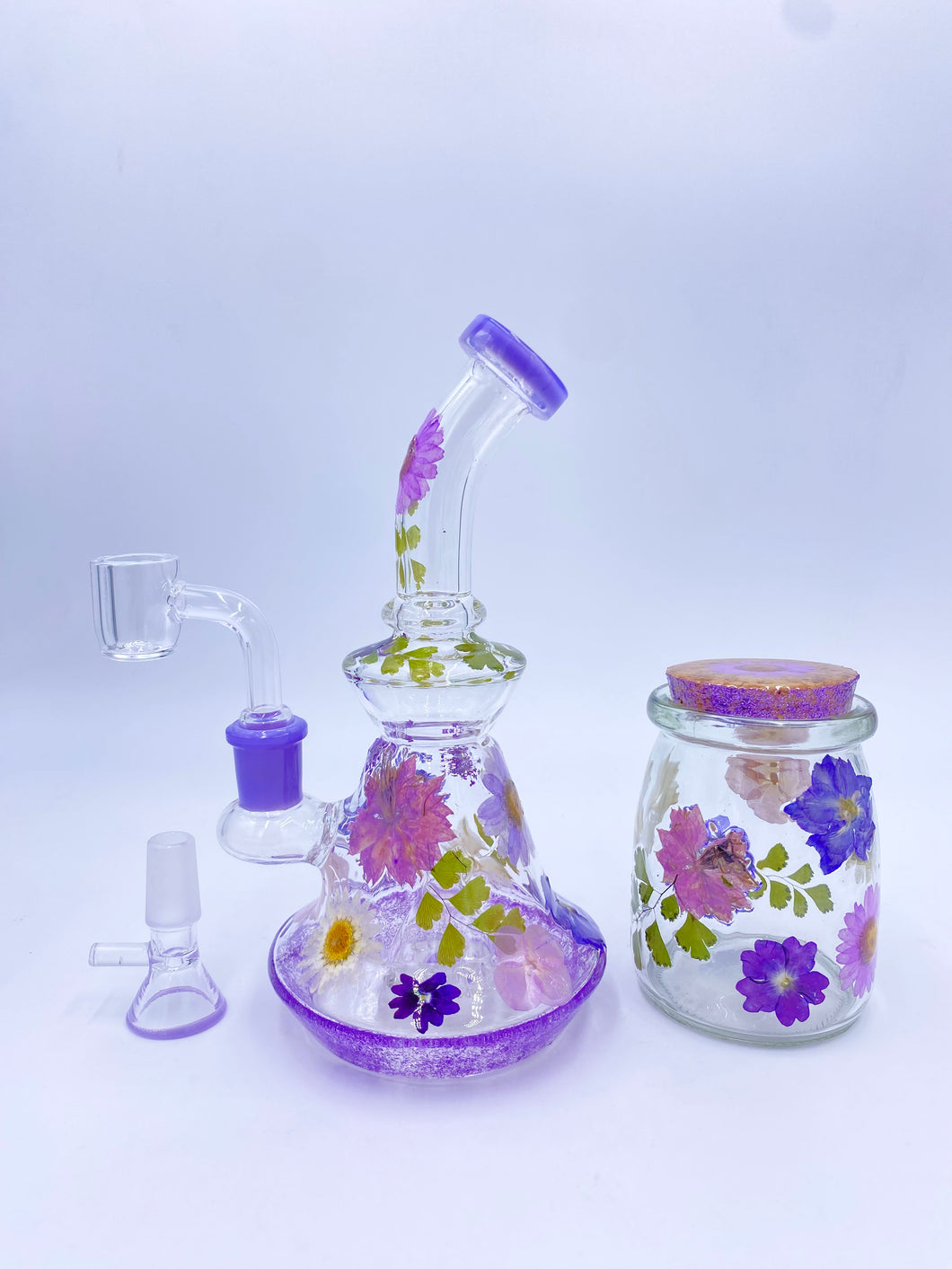 Flower bong or dab rig covered in real flowers