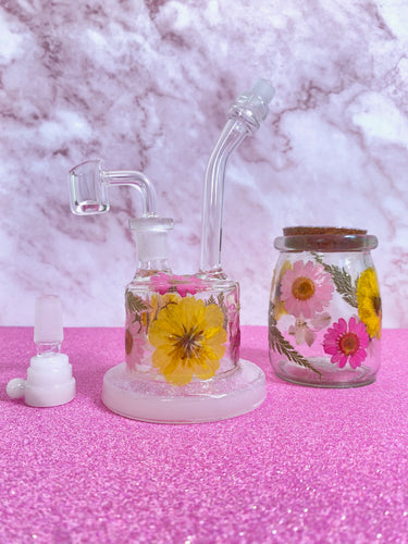 mini bong with pink and yellow flowers