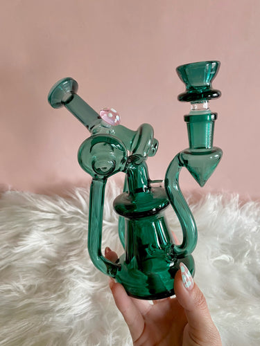 teal recycler with little pink mushroom accents